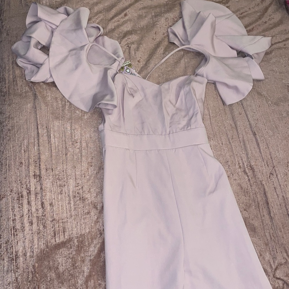Boohoo romper.. crisscrosses in the back.. size 6, lilac color.